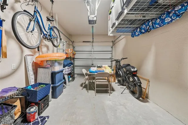 an aerial view of a house with a swimming pool outdoor seating and yard