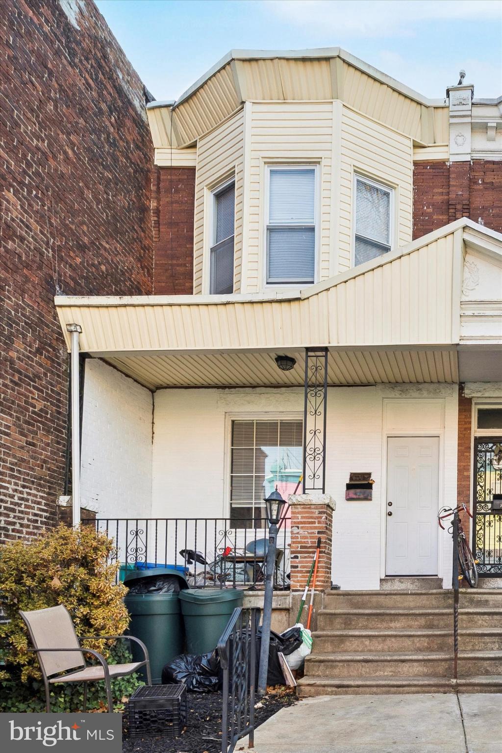 6002 West Thompson Street Philadelphia, PA 19151 - Photo 15 of 15 a view of a patio with table and chairs and wooden floor
