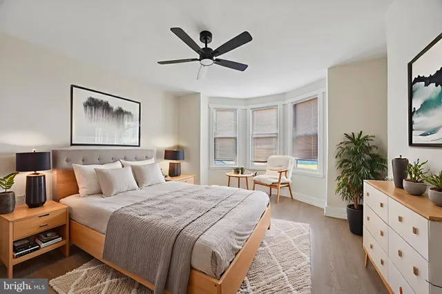 a bed room with a bed and a window