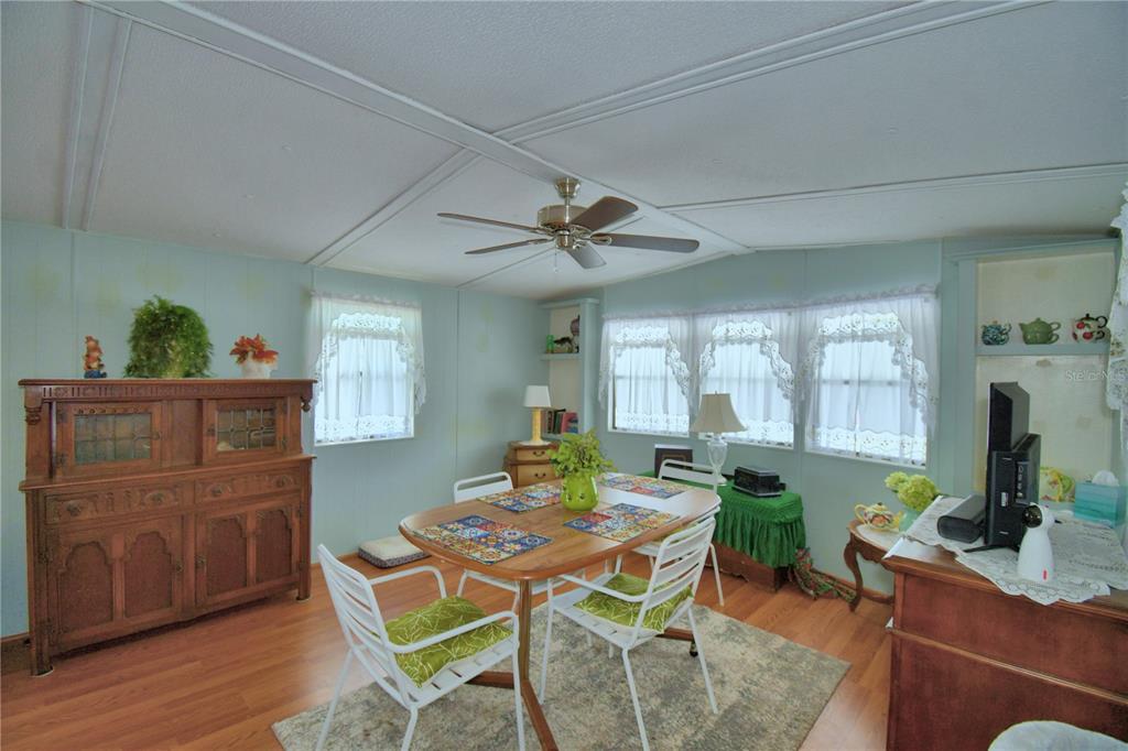 251 Patterson Road, Unit D35 Haines City, FL 33844 - Photo 17 of 37 a living room with furniture and wooden floor