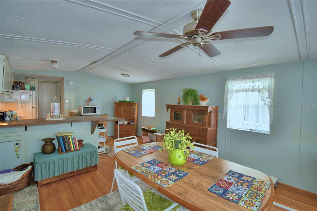 251 Patterson Road, Unit D35 Haines City, FL 33844 - Photo 19 of 37 a living room with furniture and kitchen view