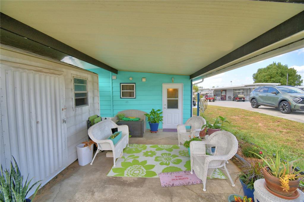 251 Patterson Road, Unit D35 Haines City, FL 33844 - Photo 24 of 37 a view of an outdoor sitting area