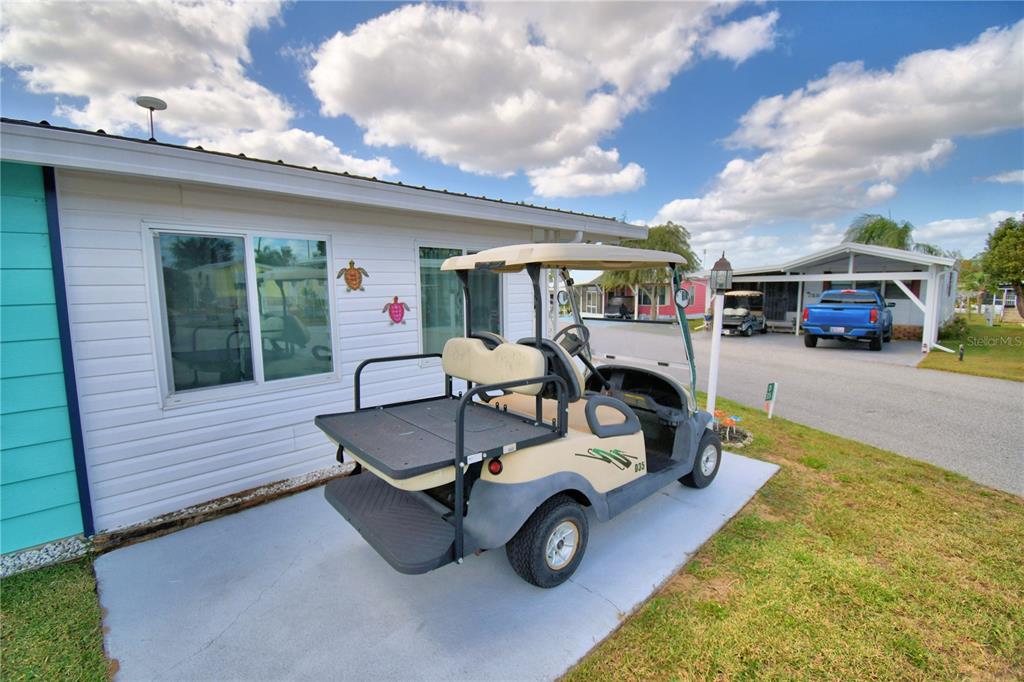 251 Patterson Road, Unit D35 Haines City, FL 33844 - Photo 6 of 37 a view of a patio with table and chairs