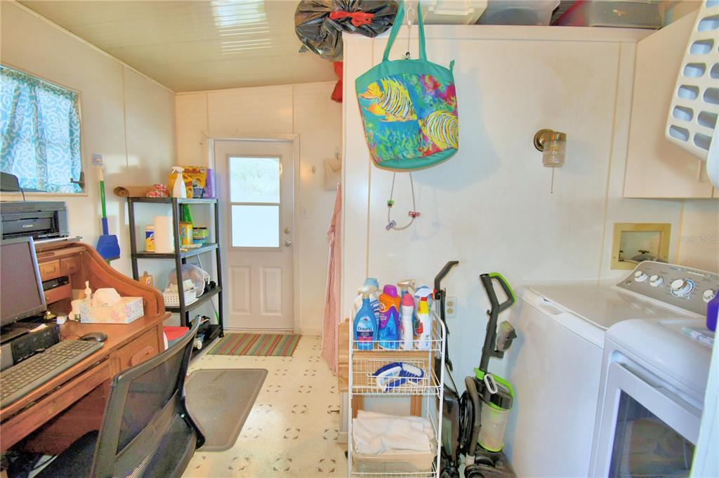 251 Patterson Road, Unit D35 Haines City, FL 33844 - Photo 9 of 37 a room with toys and storage