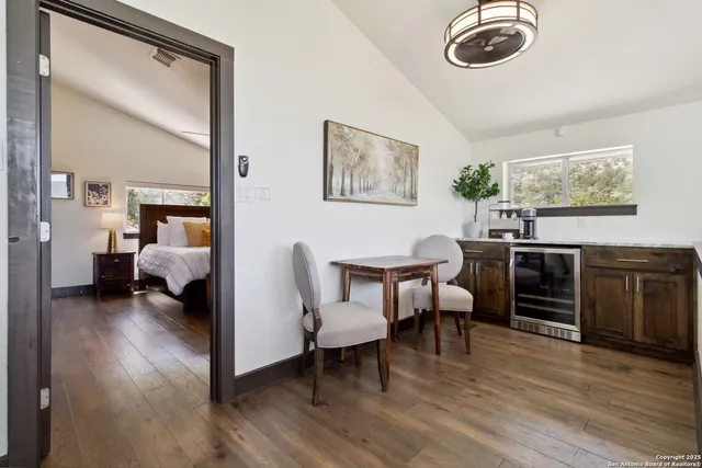 a bedroom with bed and window