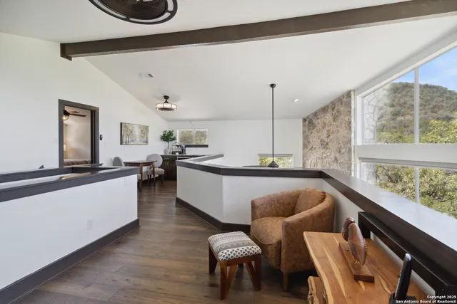 a kitchen with a sink a stove and cabinets
