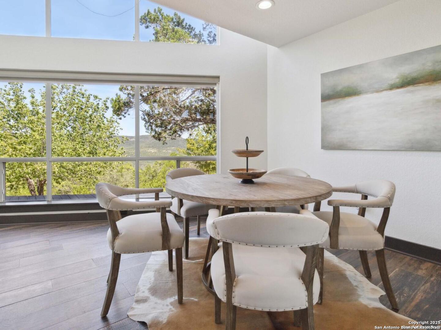 3293 North Little Creek Road Utopia, TX 78884 - Photo 2 of 65 a view of a dining room with furniture window and outside view