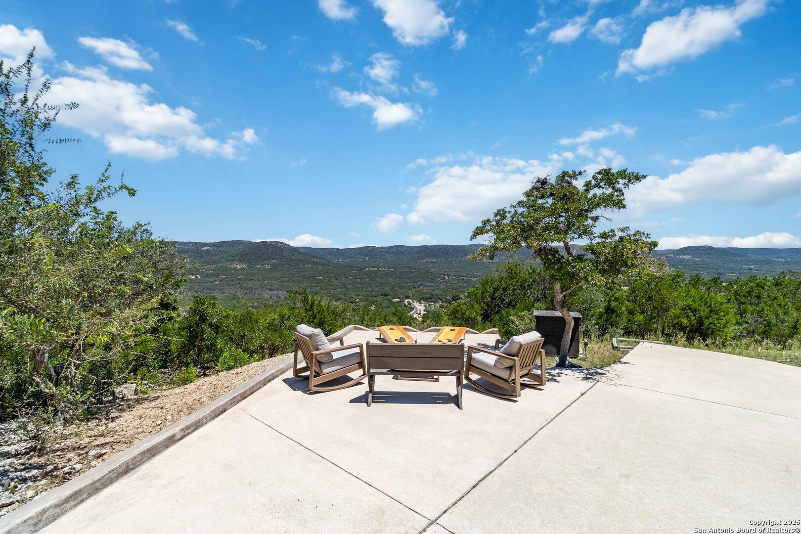 3293 North Little Creek Road Utopia, TX 78884 - Photo 40 of 65 a view of a terrace with sitting area