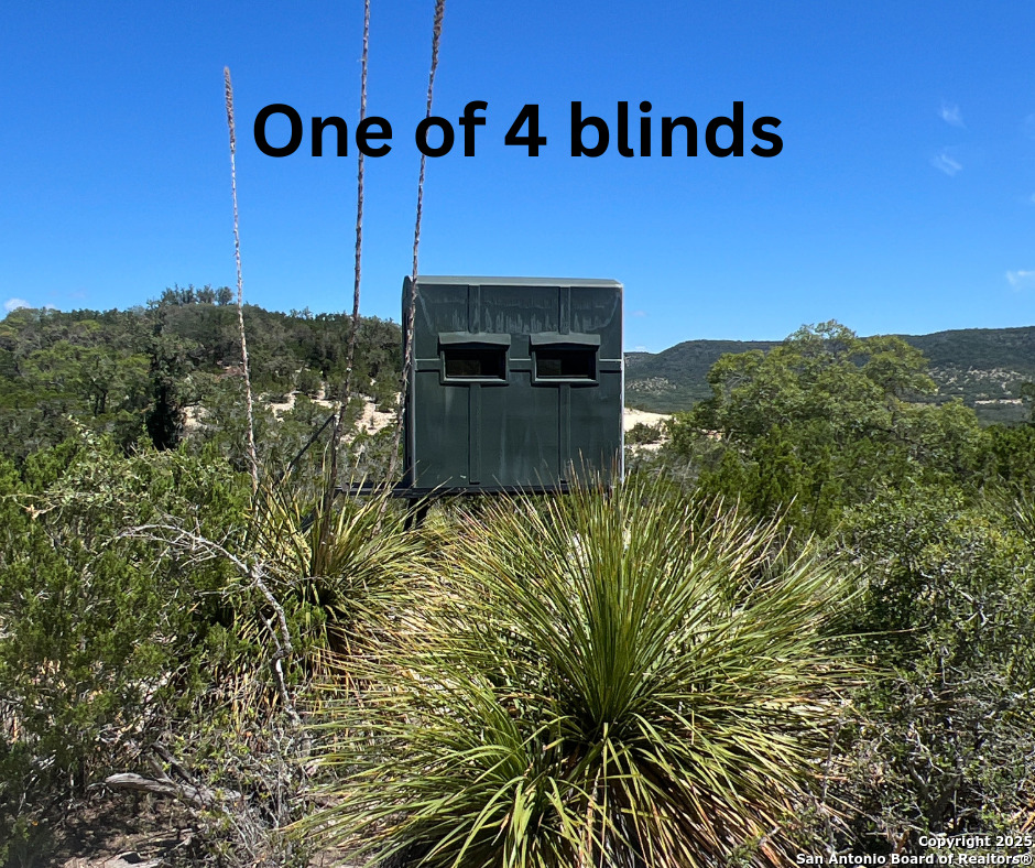3293 North Little Creek Road Utopia, TX 78884 - Photo 57 of 65 a view of a street with a building in the background