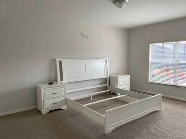 a room with furniture and window