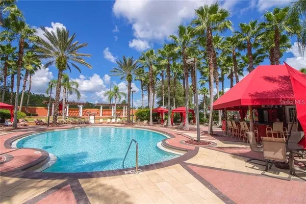a view of a swimming pool with a sitting space