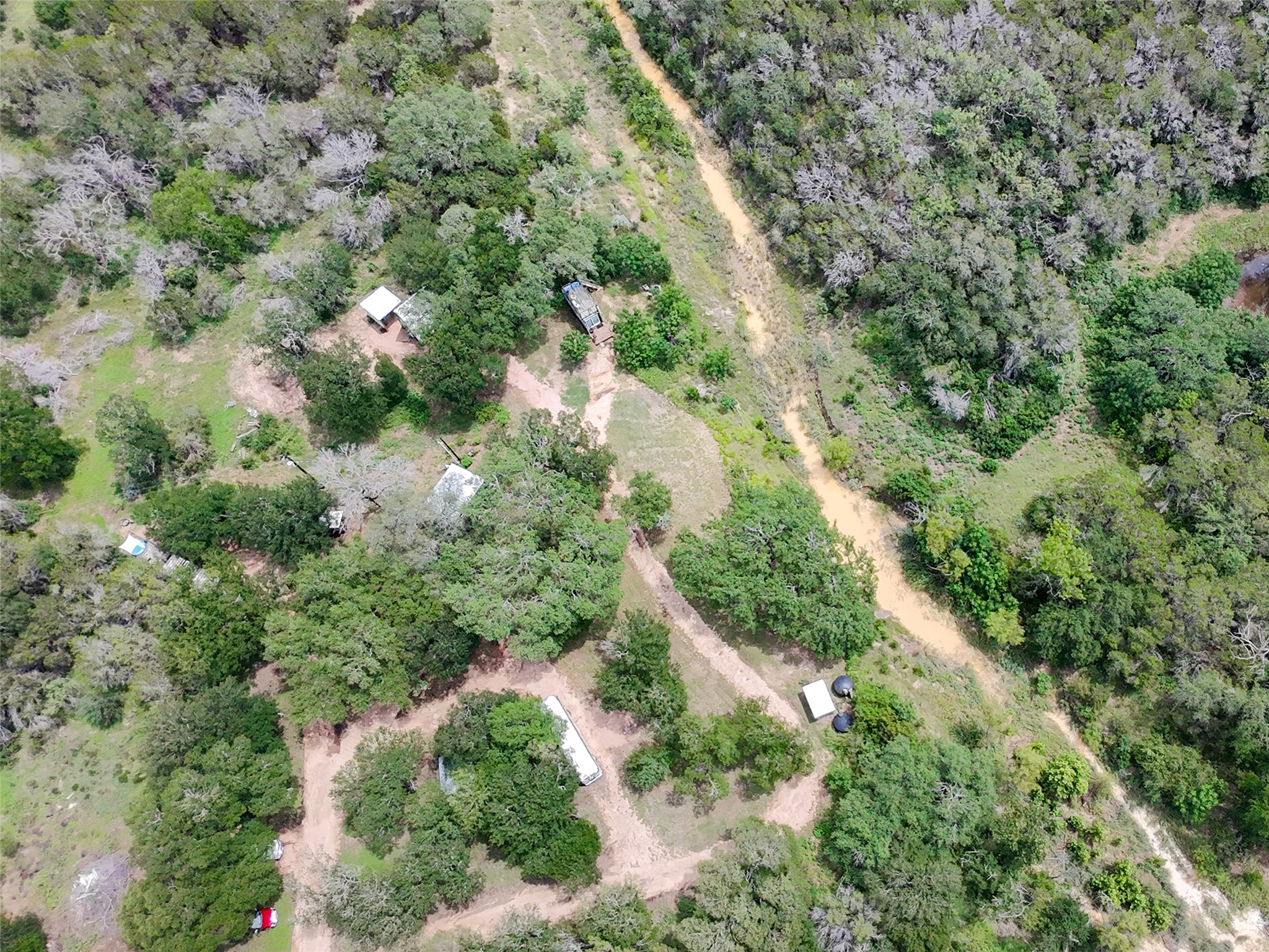 5200 Ranch To Market 1431 Marble Falls, TX 78654 - Photo 22 of 38 an aerial view of residential house with outdoor space and trees all around