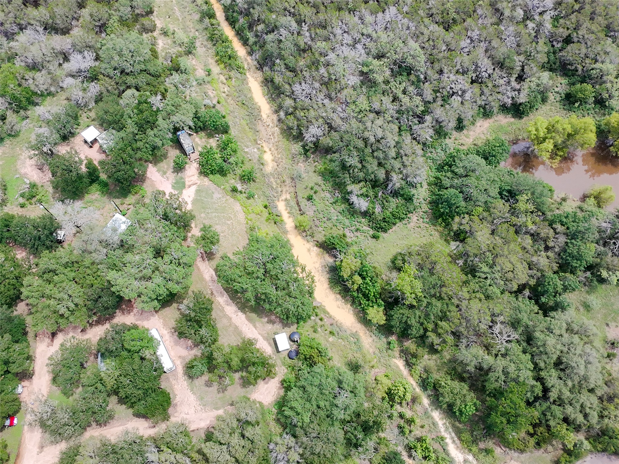 5200 Ranch To Market 1431 Marble Falls, TX 78654 - Photo 27 of 38 an aerial view of residential houses with outdoor space and trees