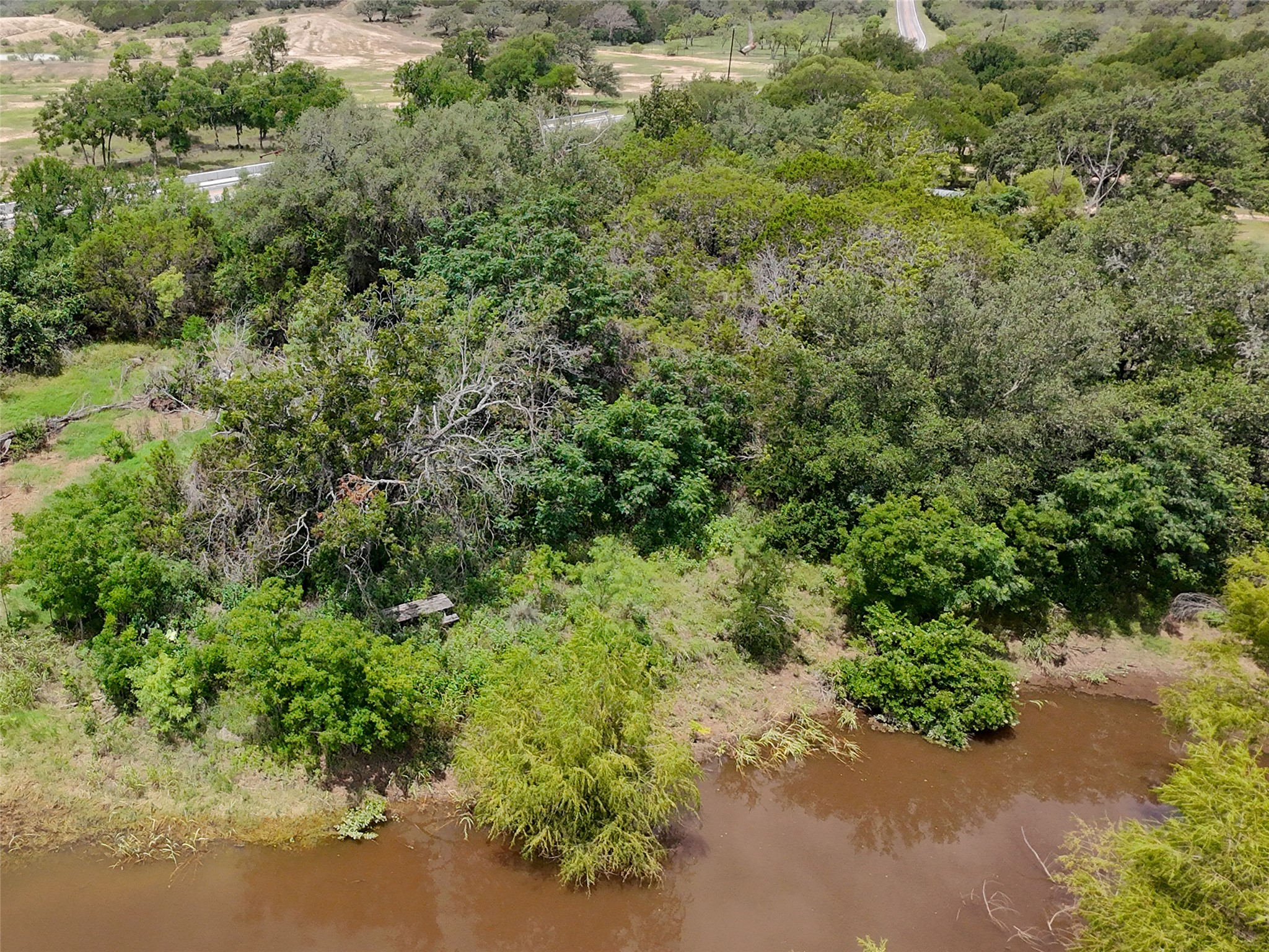 5200 Ranch To Market 1431 Marble Falls, TX 78654 - Photo 30 of 38 an aerial view of a forest with houses