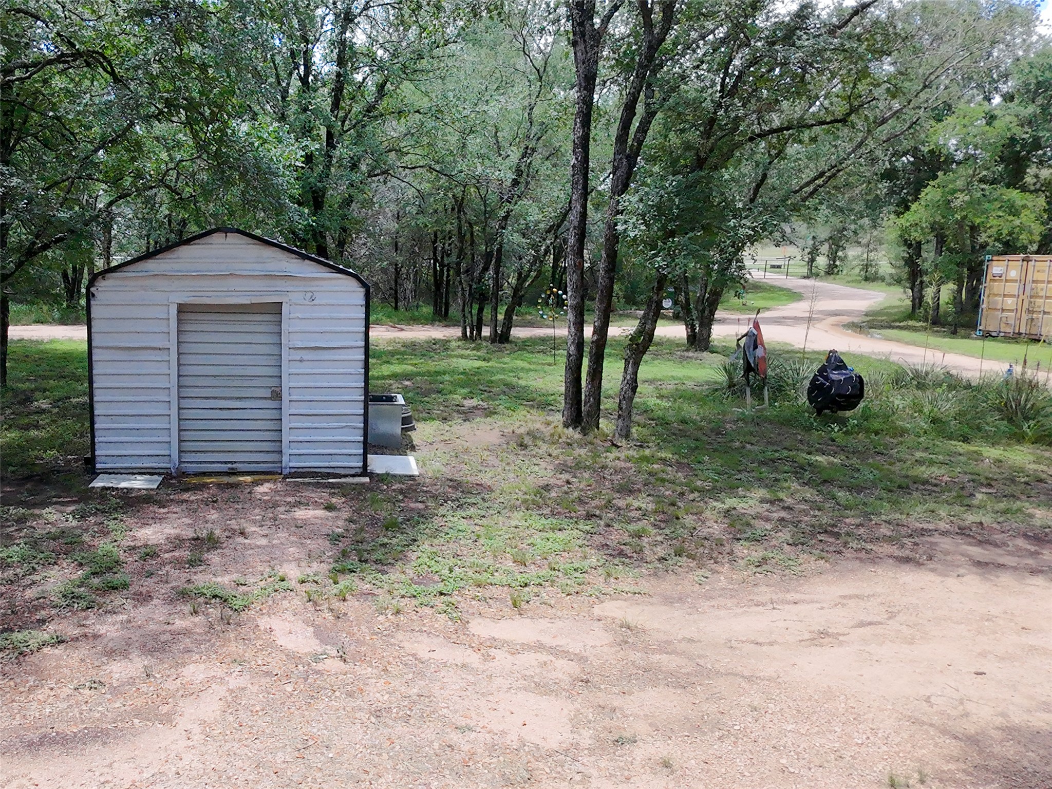 5200 Ranch To Market 1431 Marble Falls, TX 78654 - Photo 32 of 38 a backyard of a house with lots of green space