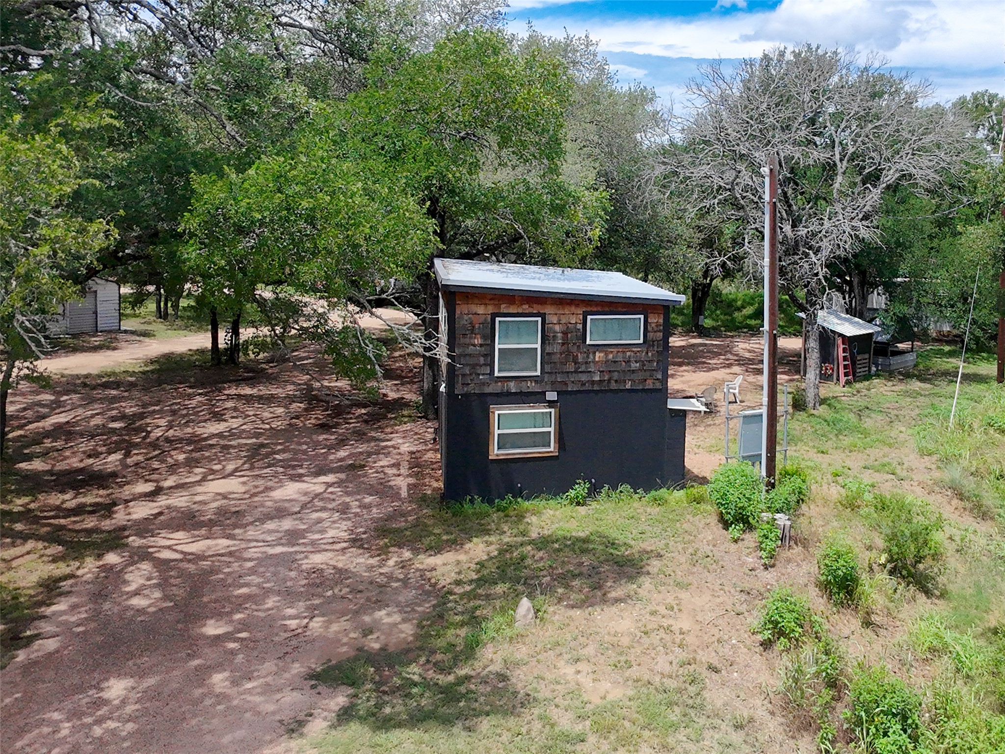 5200 Ranch To Market 1431 Marble Falls, TX 78654 - Photo 34 of 38 a view of a house with a yard