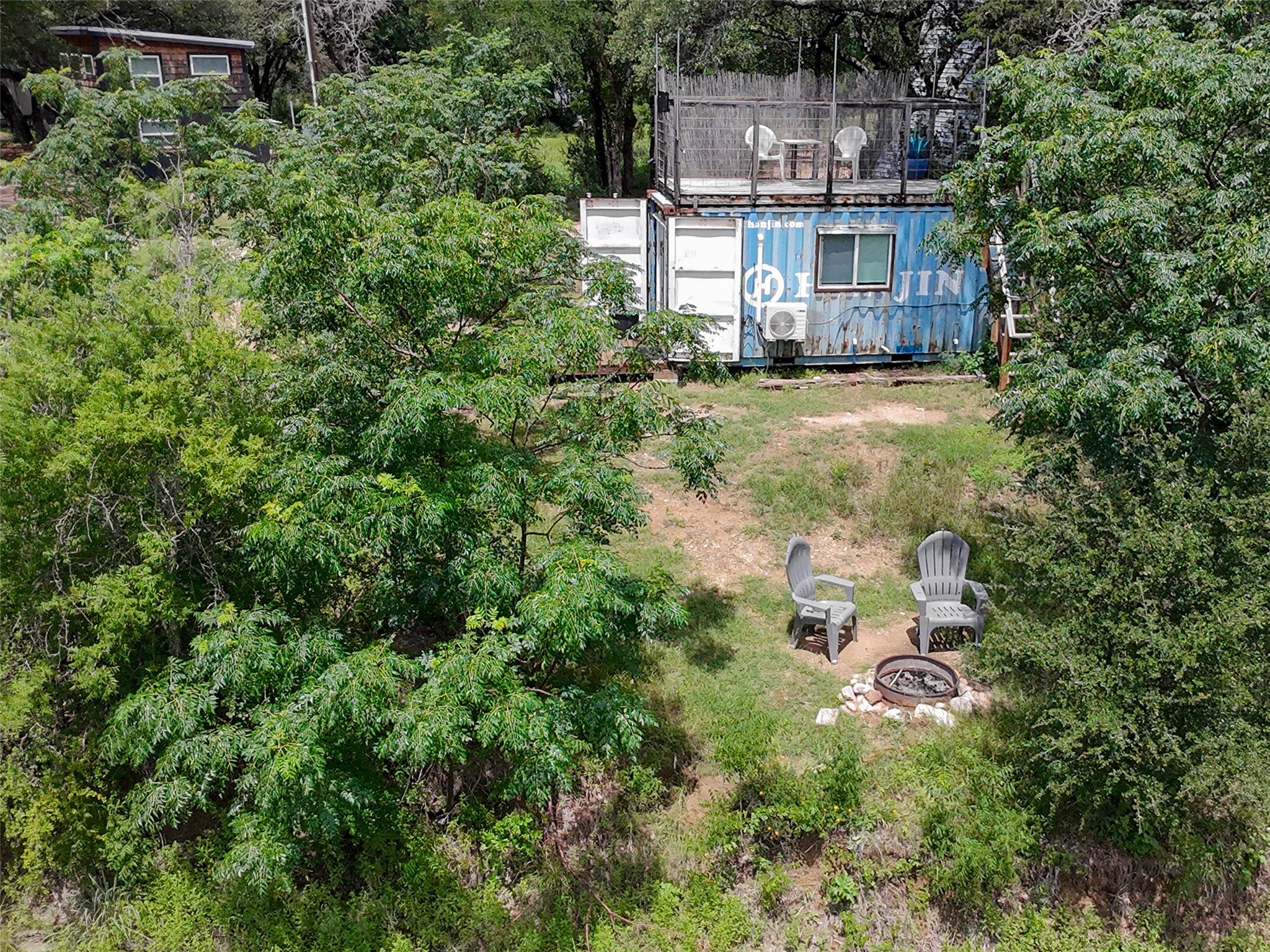 5200 Ranch To Market 1431 Marble Falls, TX 78654 - Photo 6 of 38 an aerial view of residential houses with outdoor space and trees