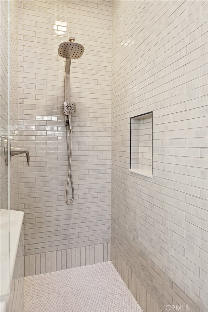5409 Magnolia Avenue Riverside, CA 92506 - Photo 19 of 21 a bathroom with a shower
