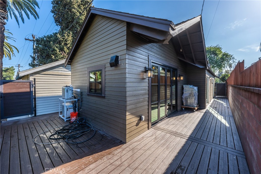 5409 Magnolia Avenue Riverside, CA 92506 - Photo 21 of 21 a view of deck with wooden floor and seating space
