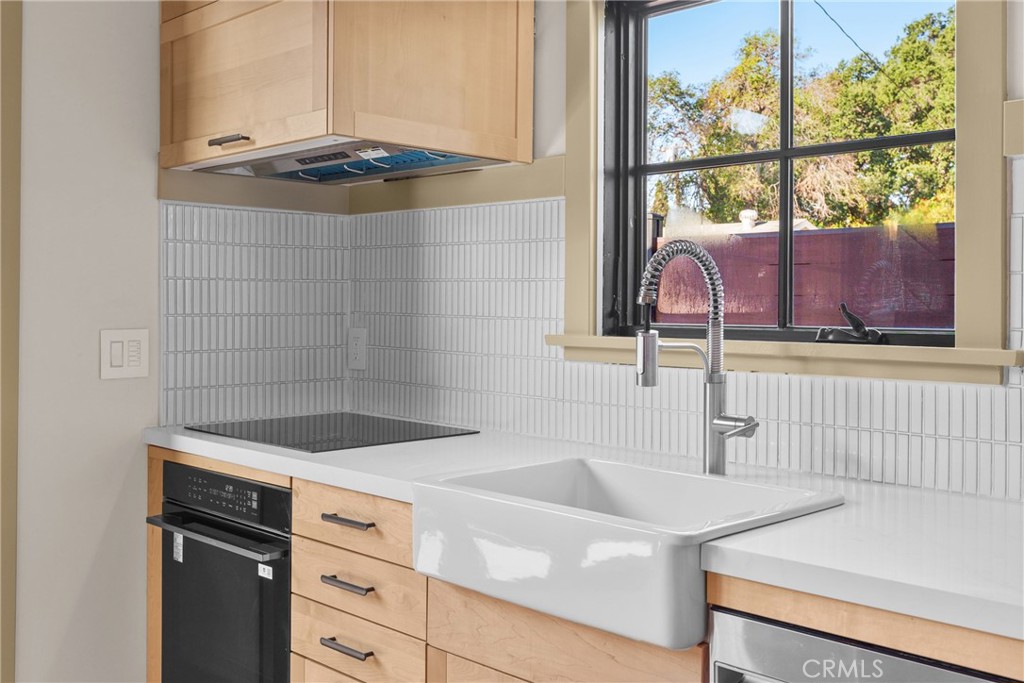 5409 Magnolia Avenue Riverside, CA 92506 - Photo 5 of 21 a bathroom with a sink and a window