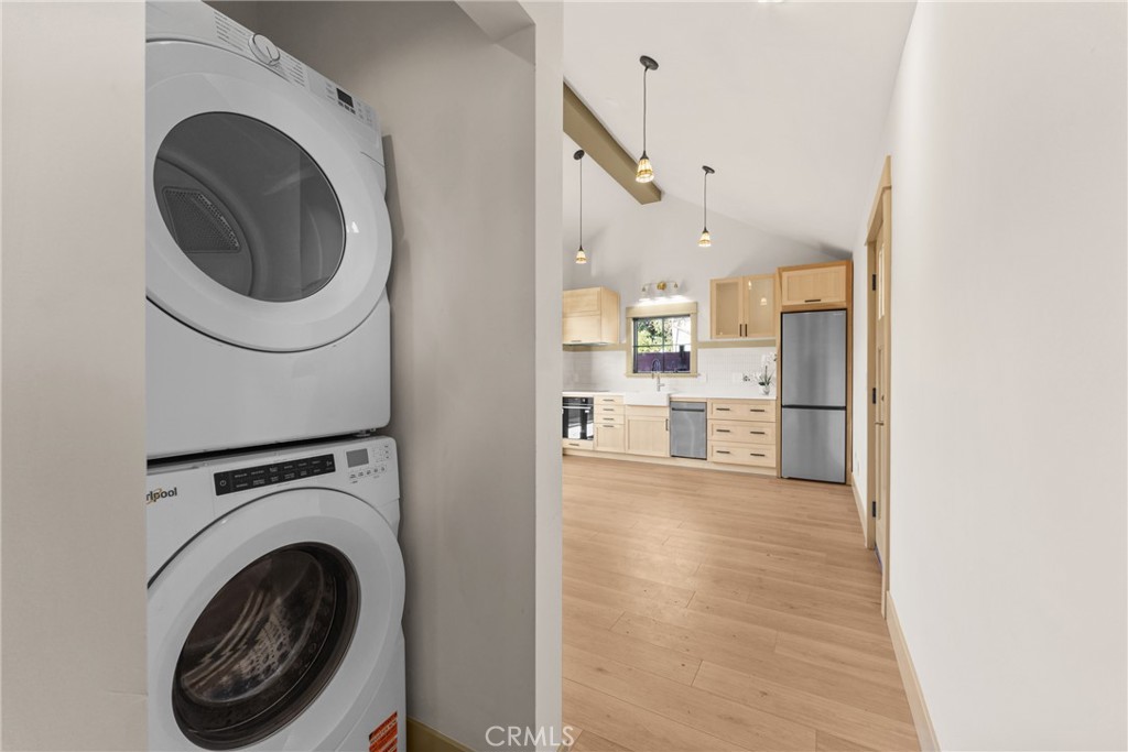 5409 Magnolia Avenue Riverside, CA 92506 - Photo 8 of 21 a view of a kitchen with a washer and dryer