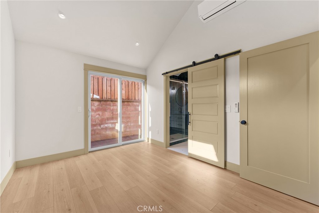 5409 Magnolia Avenue Riverside, CA 92506 - Photo 9 of 20 an empty room with windows and closet