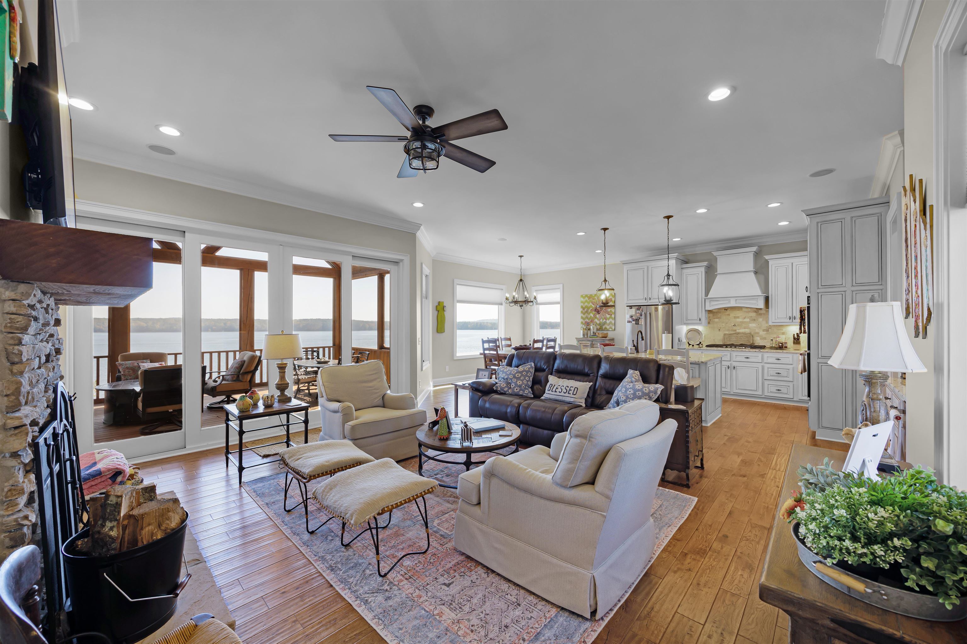 45 Pinnacle Pointe Savannah, TN 38372 - Photo 8 of 30 Living area with ceiling fan, ornamental molding, light wood-style floors, recessed lighting, and a chandelier
