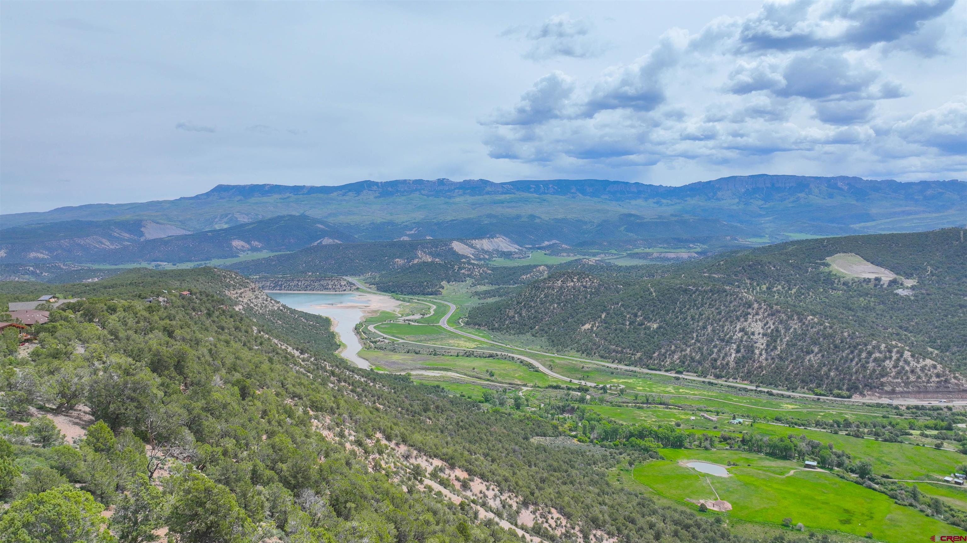 818 Pine Drive Ridgway, CO 81432 - Photo 7 of 25 a view of a backyard with green space