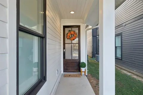 a view of a entryway door front of house