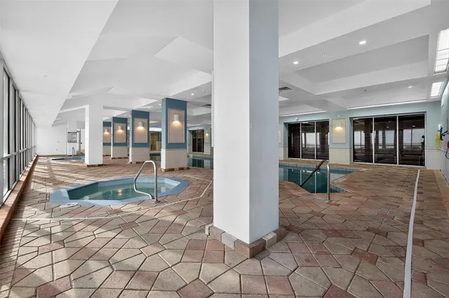 a lobby with furniture and window