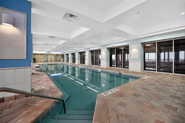 a view of a swimming pool with a terrace