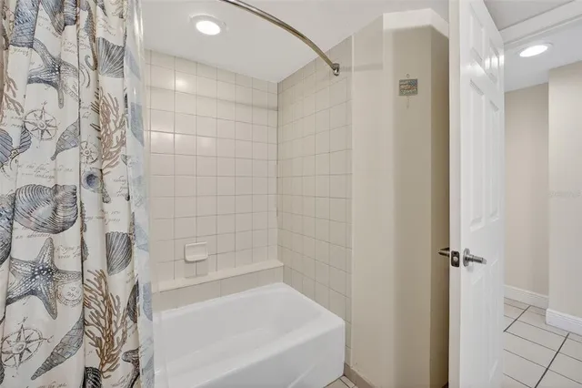 a kitchen with stainless steel appliances a refrigerator sink and cabinets