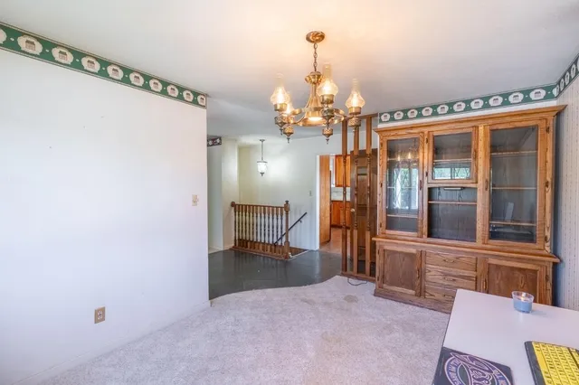 a view of a livingroom with a chandelier