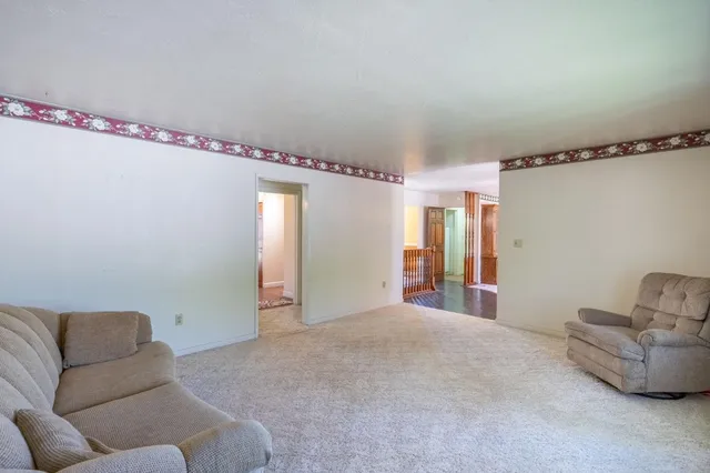 a living room with furniture and a couch