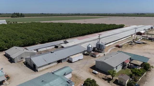 an aerial view of a house with lake view and mountain view