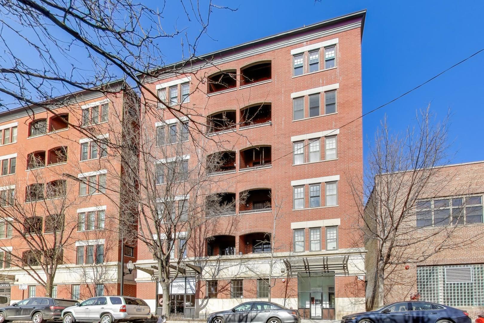 1148 West Monroe Street, Unit 5NE Chicago, IL 60607 - Photo 1 of 21 a front view of a building