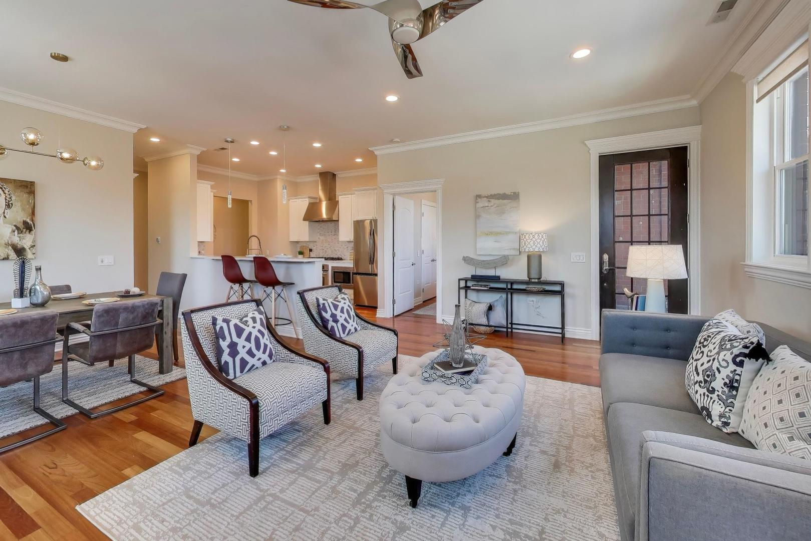1148 West Monroe Street, Unit 5NE Chicago, IL 60607 - Photo 4 of 21 a living room with furniture and a wooden floor