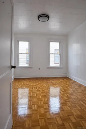 a view of an empty room and window