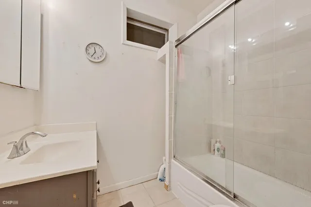 a bathroom with a sink and a tub