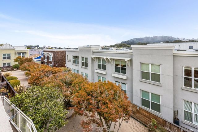 a aerial view of a house with a garden