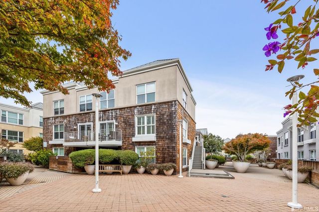 a front view of a building with street view