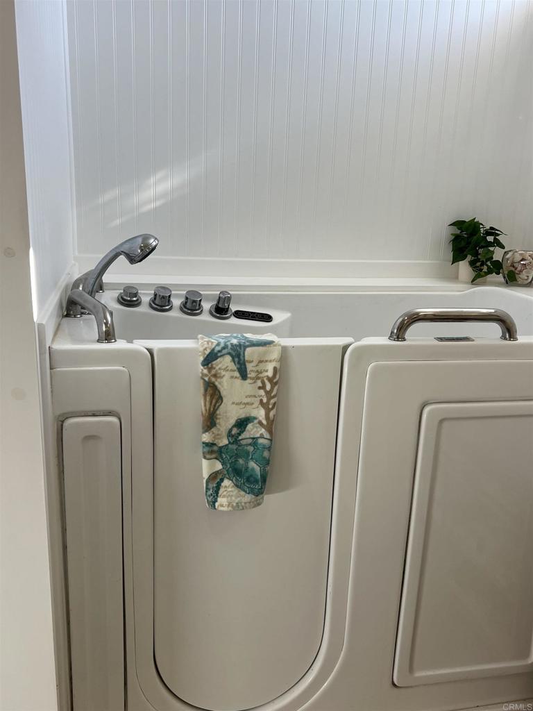 18218 Paradise Mountain Road, Unit SPACE 83 Valley Center, CA 92082 - Photo 13 of 50 a utility room with dryer and washer