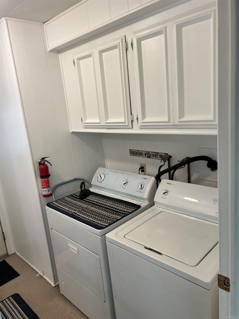 18218 Paradise Mountain Road, Unit SPACE 83 Valley Center, CA 92082 - Photo 18 of 50 a utility room with dryer and washer