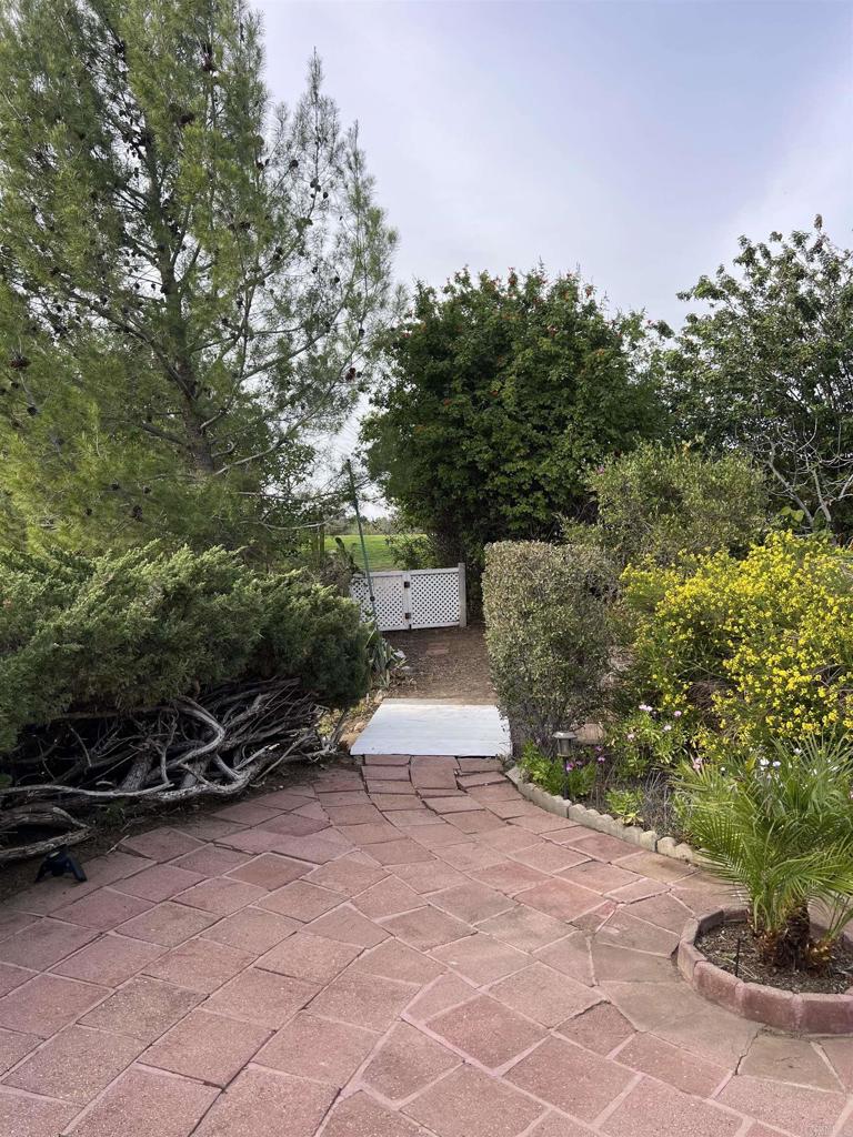 18218 Paradise Mountain Road, Unit SPACE 83 Valley Center, CA 92082 - Photo 3 of 50 a pathway of a yard