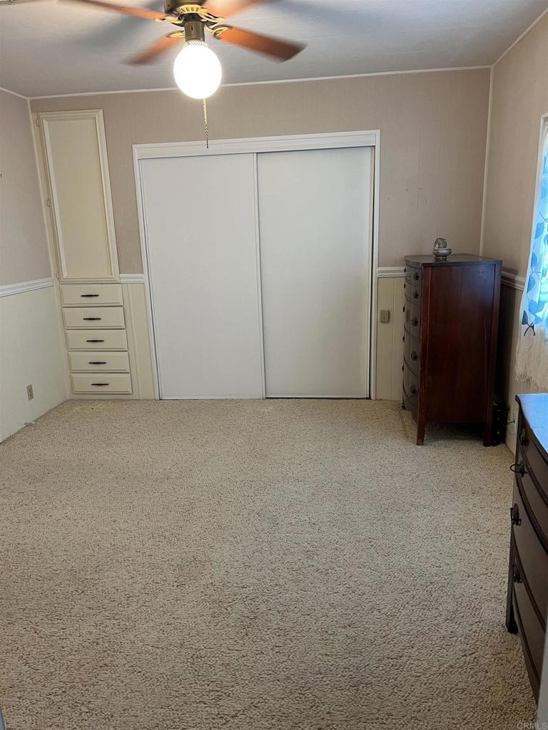 18218 Paradise Mountain Road, Unit SPACE 83 Valley Center, CA 92082 - Photo 8 of 50 a view of an empty room with a window