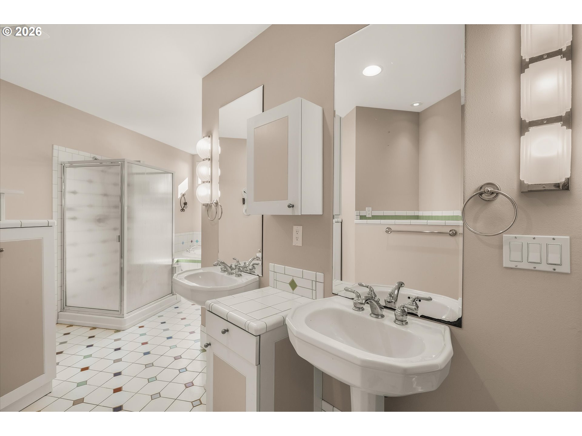 438 Shellmidden Way Yachats, OR 97498 - Photo 23 of 40 a bathroom with a sink double vanity and a mirror