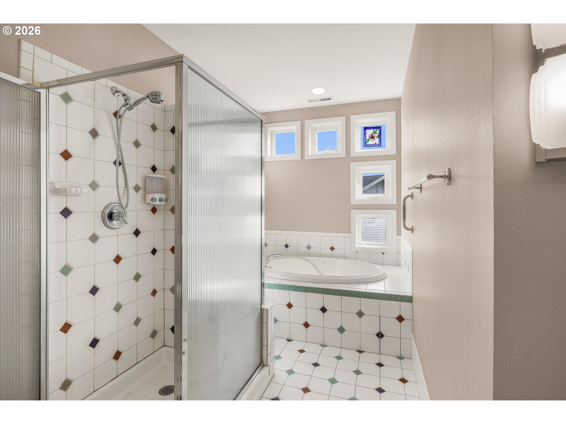 438 Shellmidden Way Yachats, OR 97498 - Photo 24 of 40 a bathroom with a sink a mirror and a shower