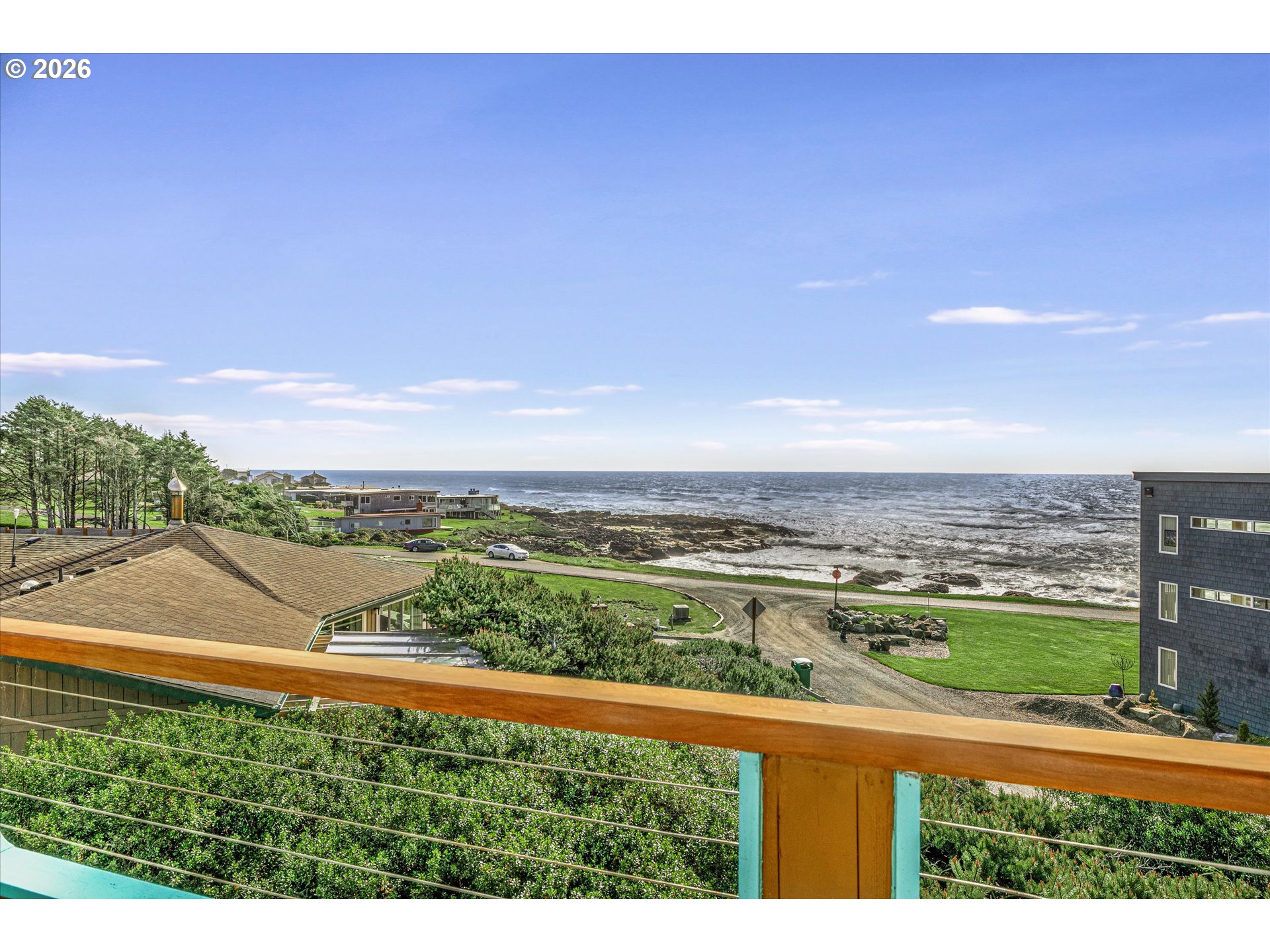 438 Shellmidden Way Yachats, OR 97498 - Photo 3 of 40 a view of a city and an ocean