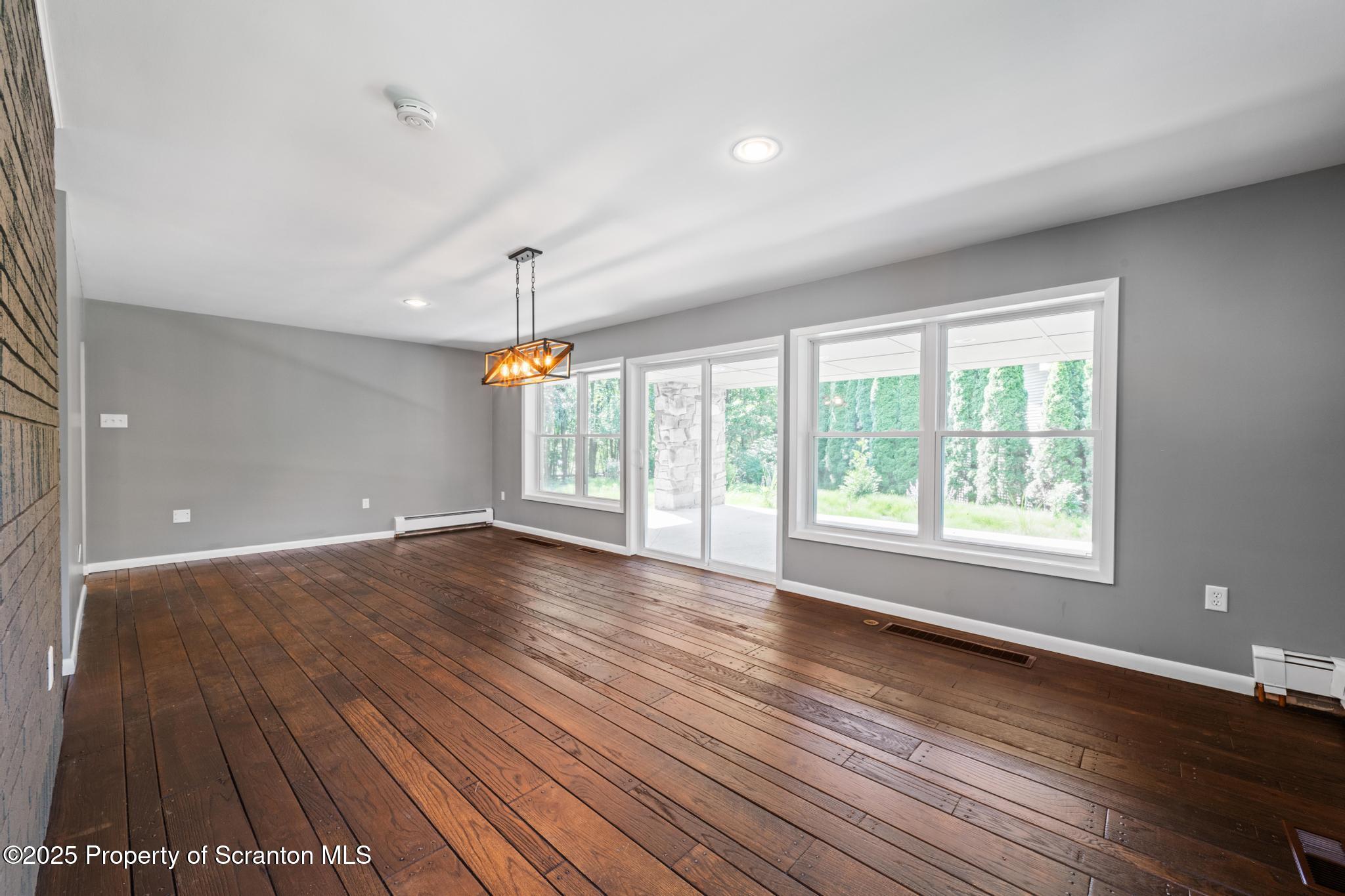 2001 Cleveland Avenue Scranton, PA 18505 - Photo 20 of 87 a view of an empty room with wooden floor and a window