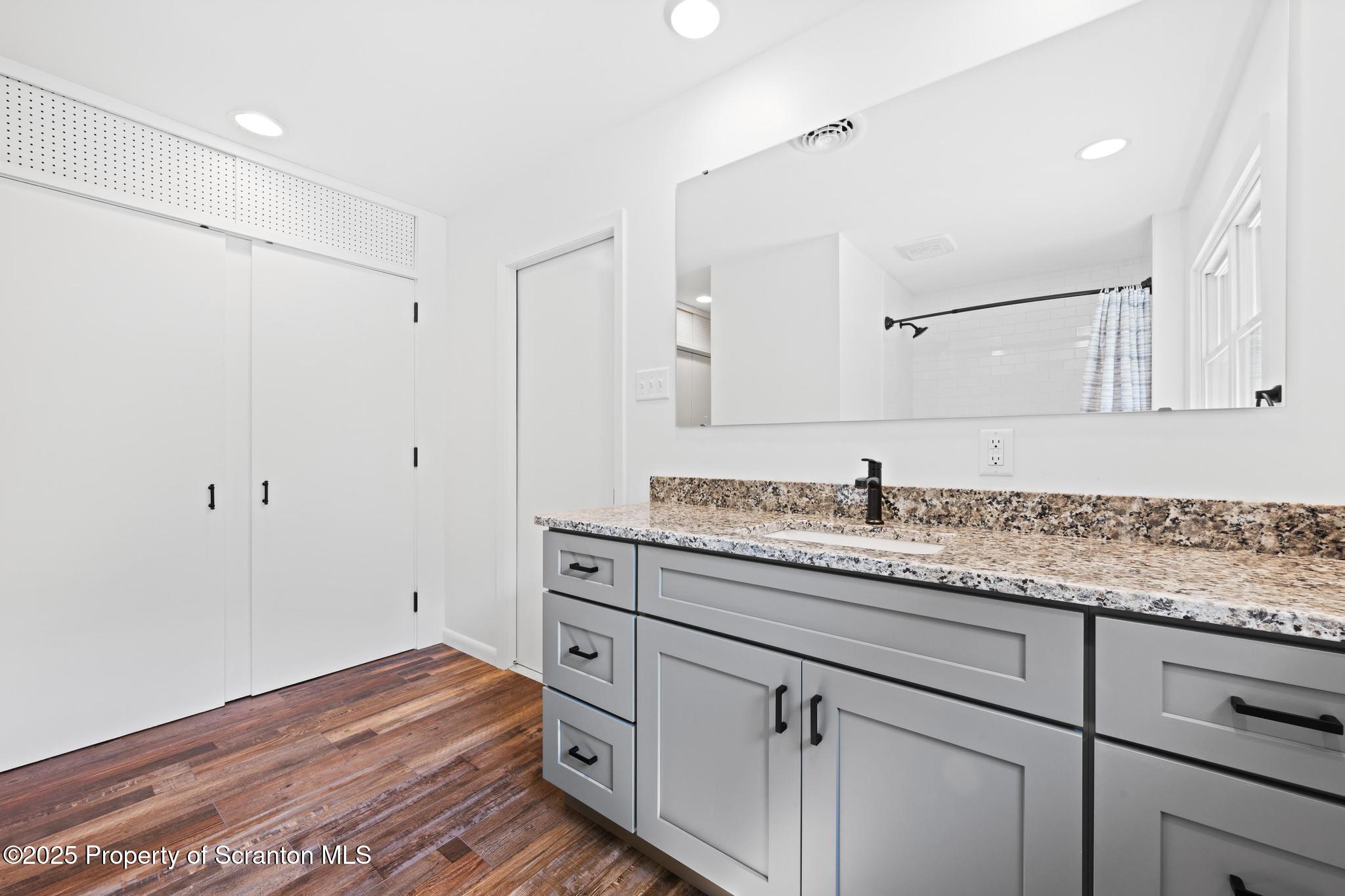 2001 Cleveland Avenue Scranton, PA 18505 - Photo 41 of 87 a bathroom with a sink and a mirror